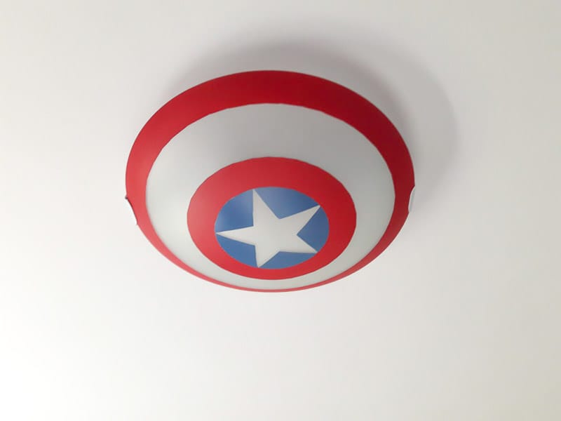 a lamp with spray paint to recreate the shield of Captain America